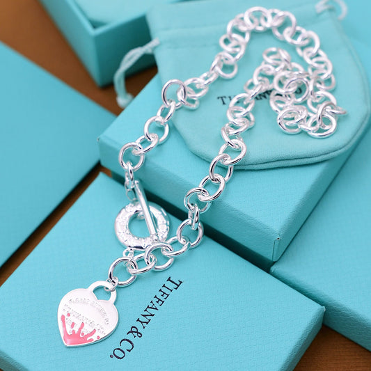 Return to Tiffany Heart  pink Tag Charm Bracelet  in Sterling Silver