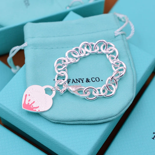 Pulsera con dije de etiqueta rosa en forma de corazón Return to Tiffany de plata esterlina