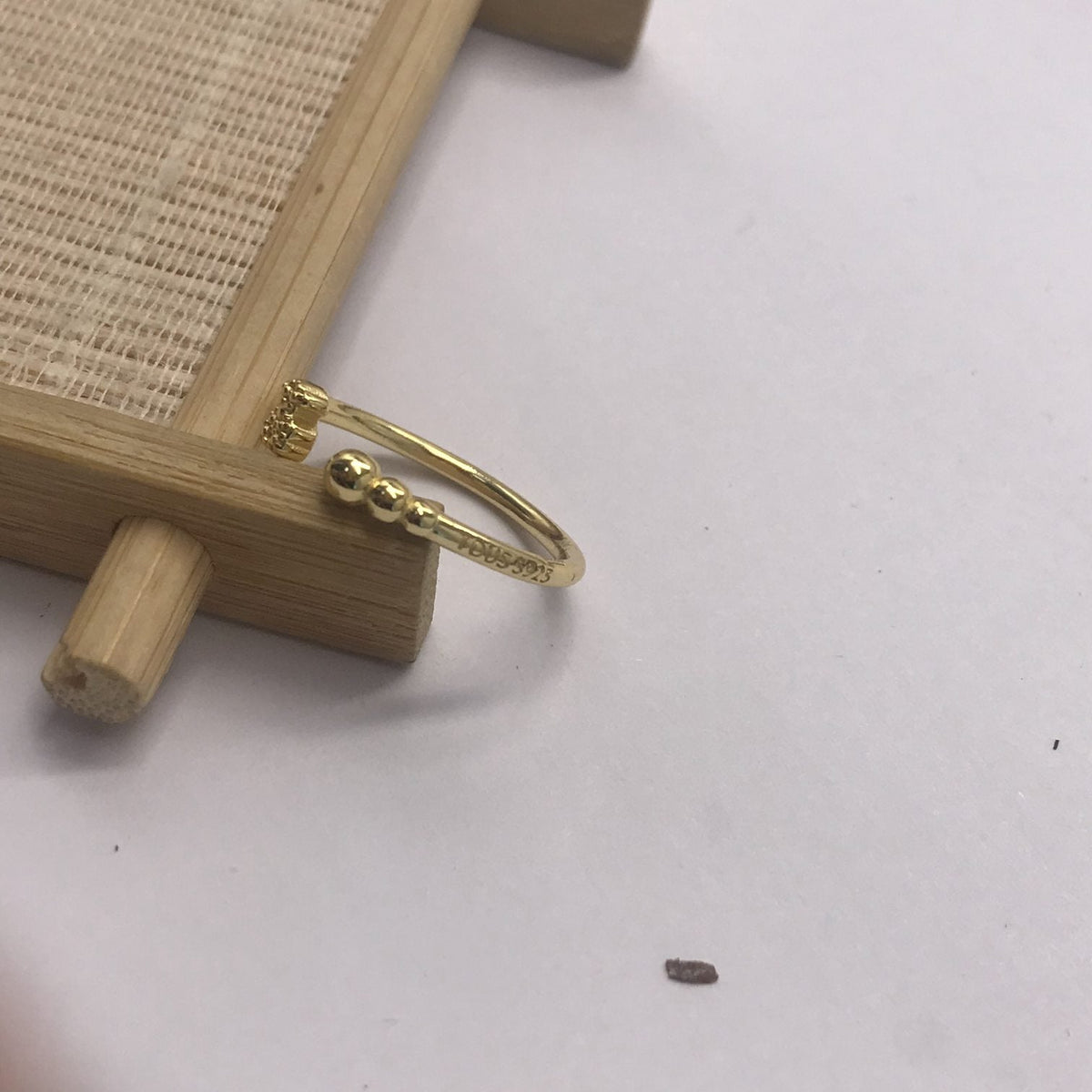 Small open Ring with  plating over silver and motifs Grain