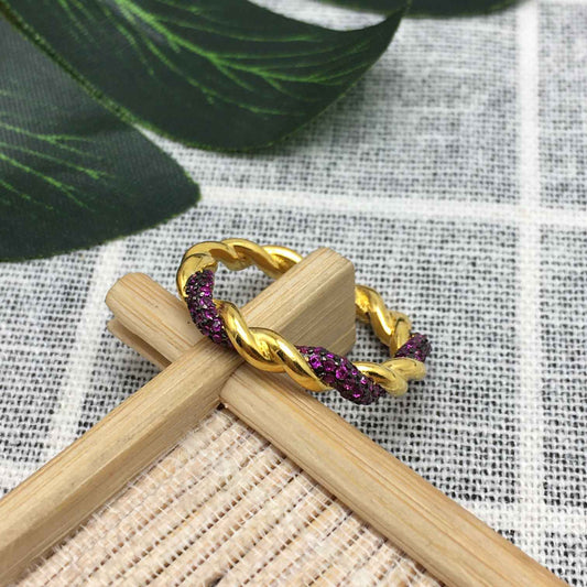 Twisted Ring with blue sapphire