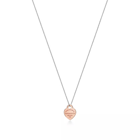 Return to Tiffany®:Heart Tag Pendant in Sterling Silver and Rose Gold, Small