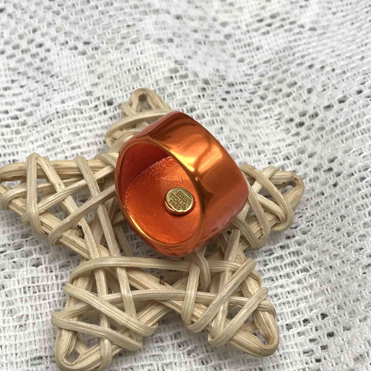 Oursin seal in orange sterling silver with a central bear with  plating over silver
