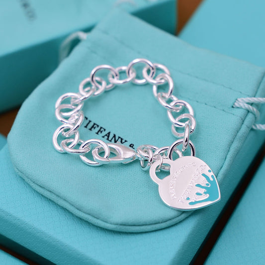 Pulsera con dije de corazón azul Return to Tiffany con etiqueta en plata de ley