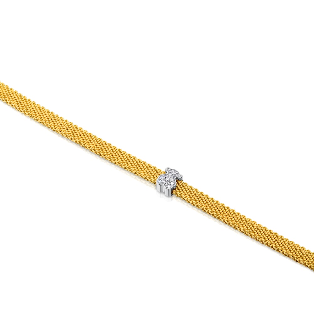 Pulsera de malla de oro amarillo y blanco con diamantes y motivo de oso