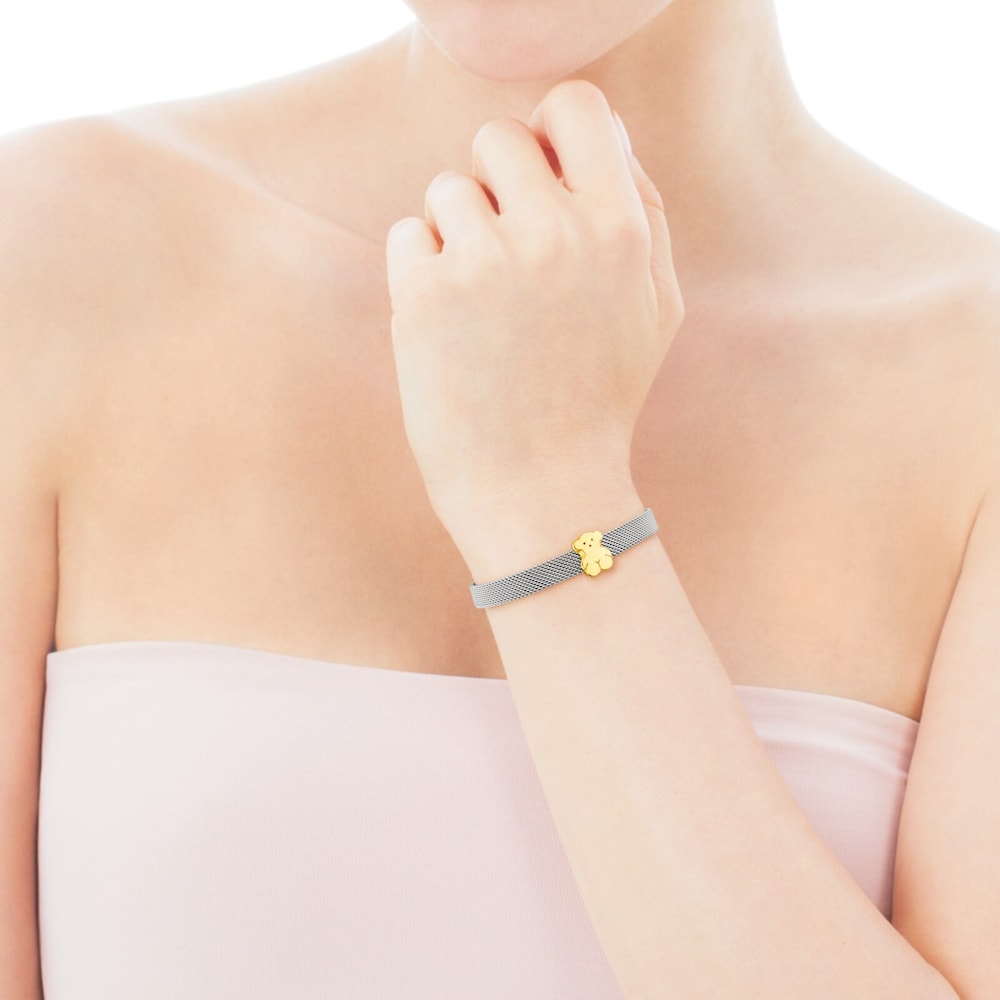 Brazalete de malla en oro amarillo de 18 kt y acero. Tamaño de oso 0,7 cm. Longitud 16 cm
