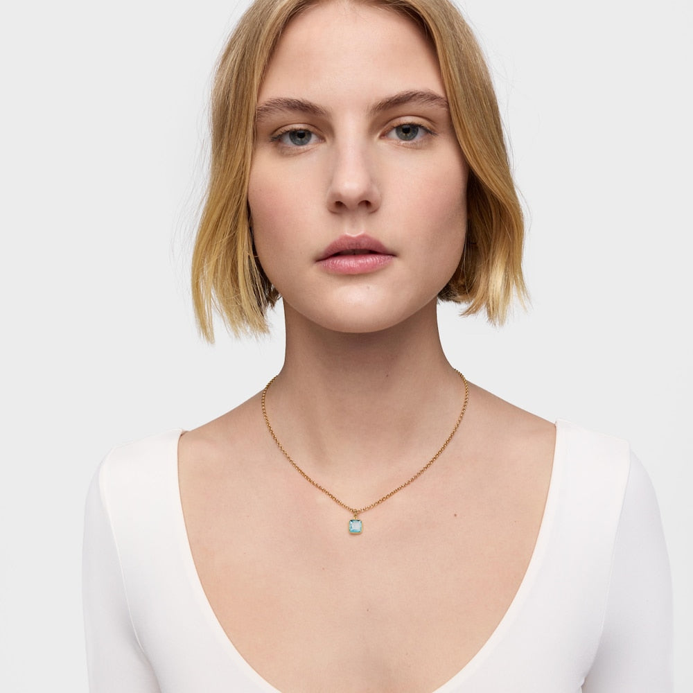 Small  plating over silver Pendant with topaz Medallions |