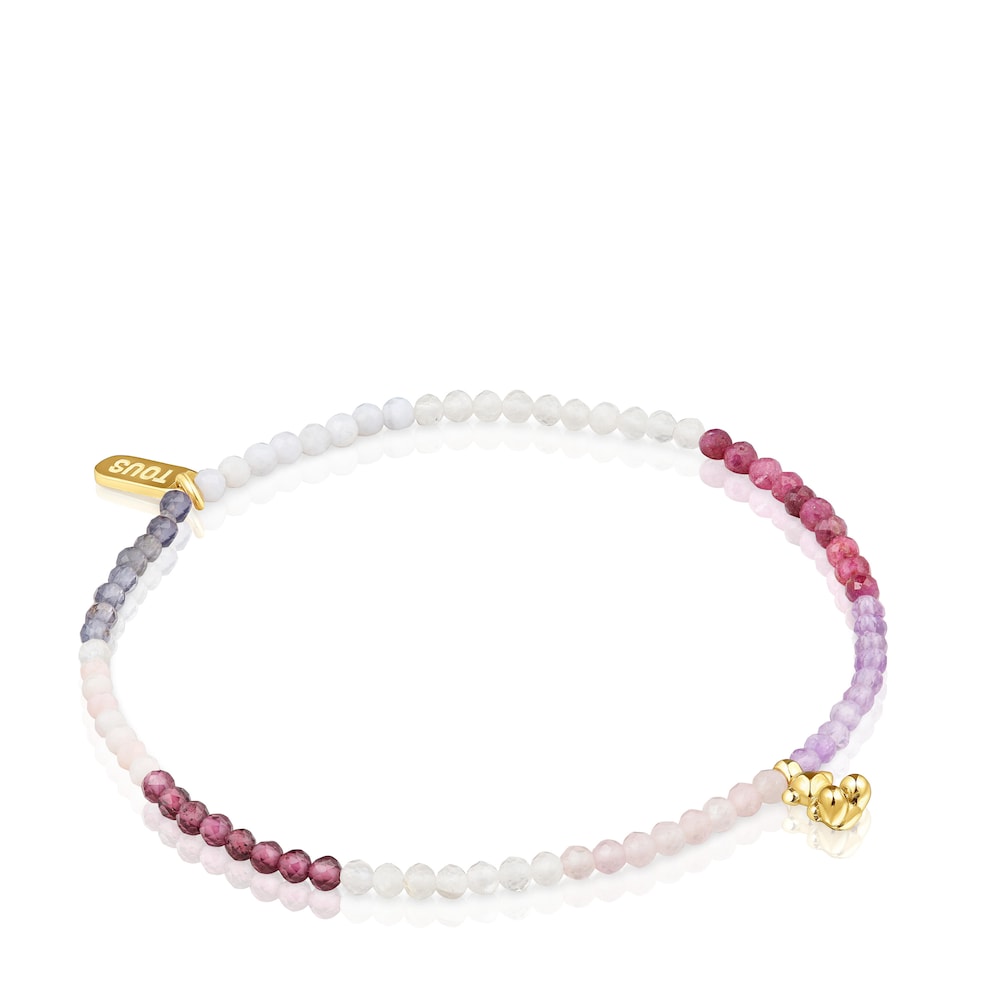 Pulsera elástica de plata con baño de oro de 18kt, gemas rosas y un atrevido oso