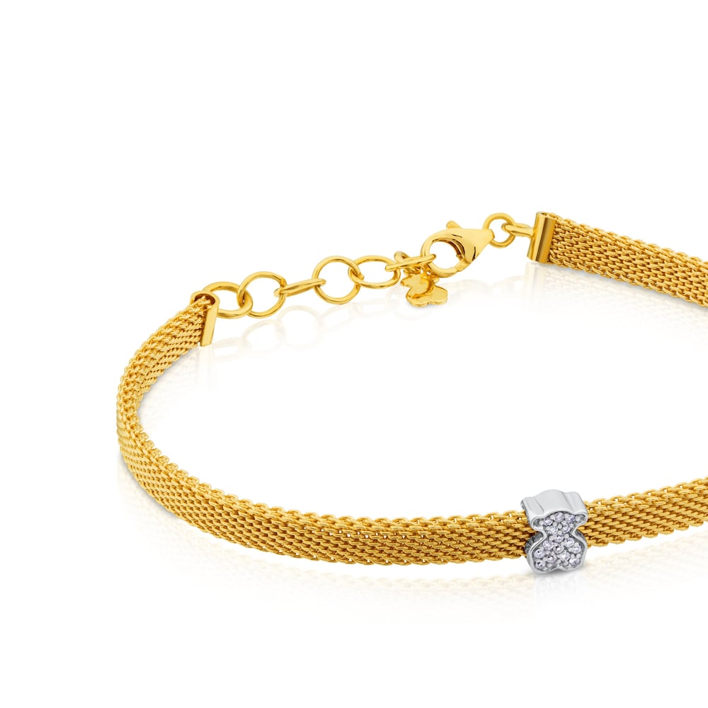 Pulsera de malla de oro amarillo y blanco con diamantes y motivo de oso