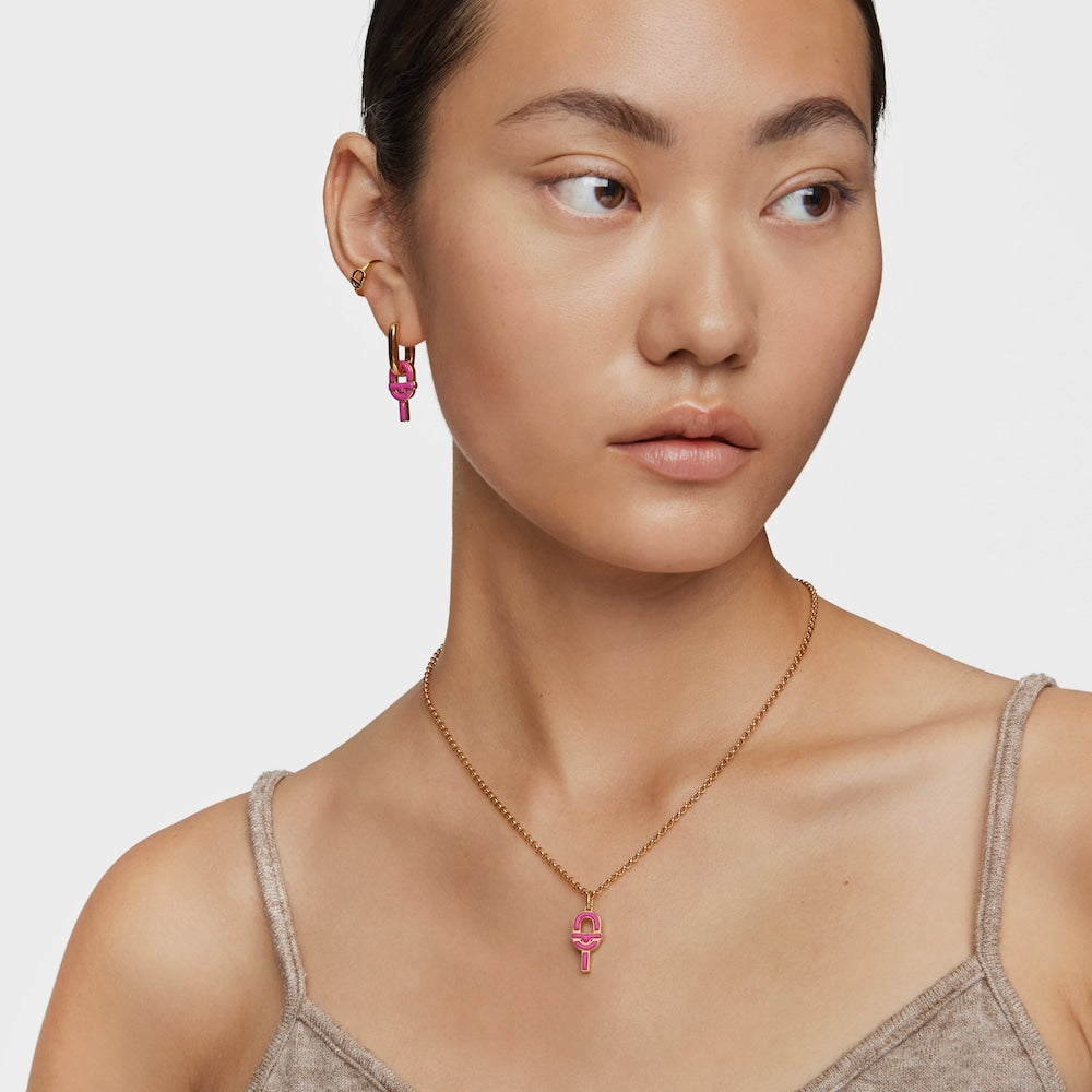 Medium Pendant with 18kt gold plating over silver and fuchsia-colored enamel  MANIFESTO