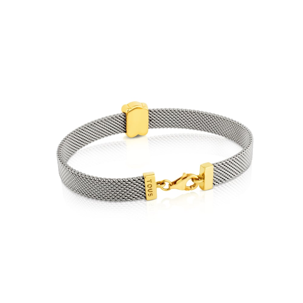 Brazalete de malla en oro amarillo de 18 kt y acero. Tamaño de oso 0,7 cm. Longitud 16 cm