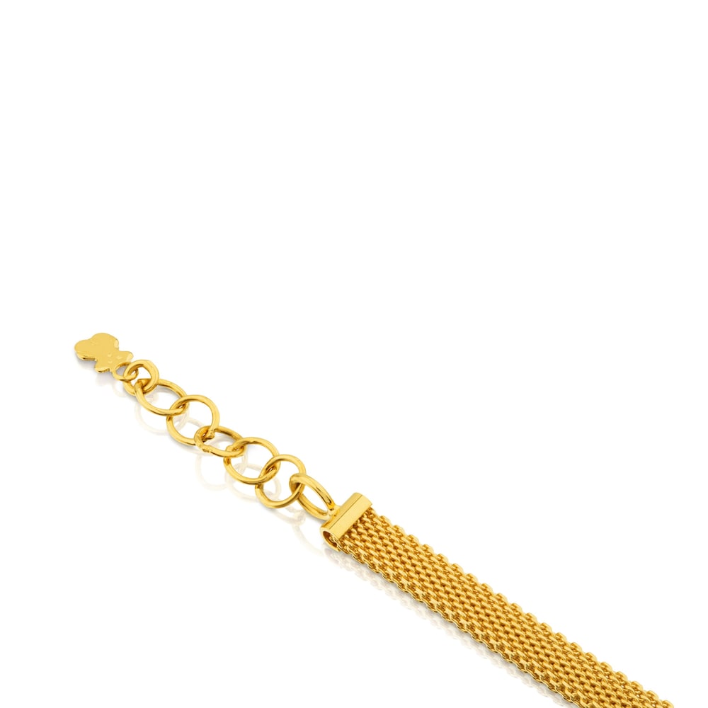 Pulsera de malla de oro amarillo y blanco con diamantes y motivo de oso