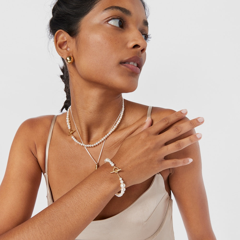 Pulsera con colgante de perla cultivada y vermeil de plata |