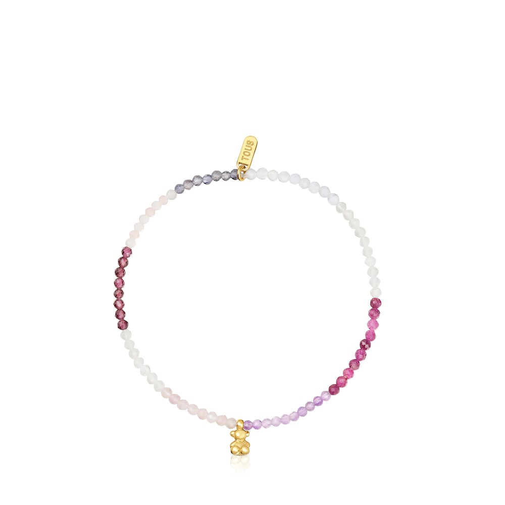 Pulsera elástica de plata con baño de oro de 18kt, gemas rosas y un atrevido oso